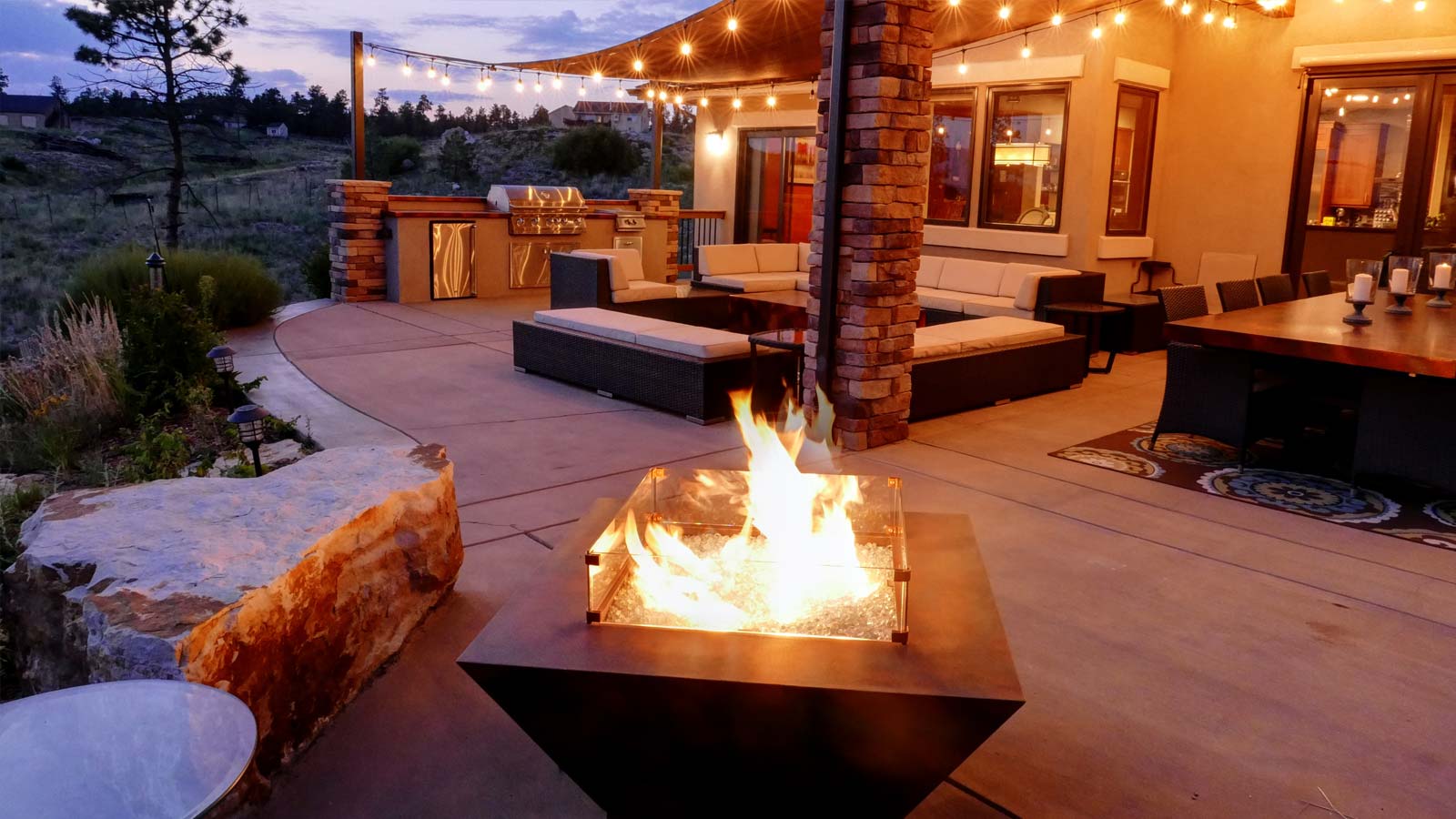 Fire pit designed with outdoor patio