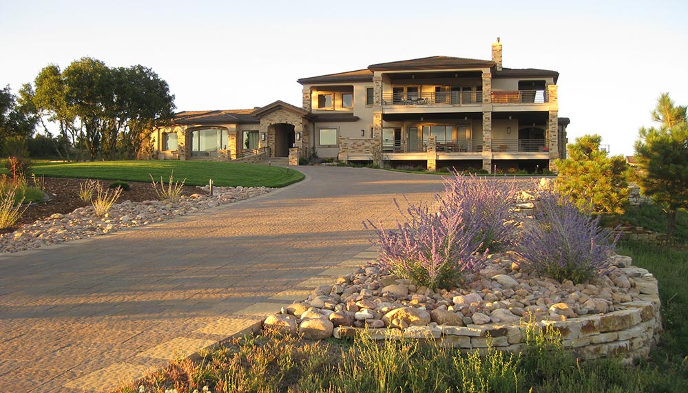 Landscape that utilizes native grass, making even this large landscape very water friendly.